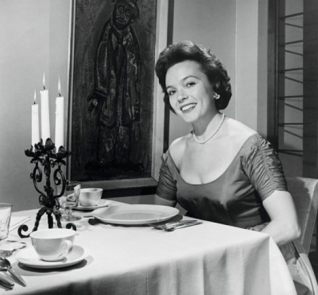 Portrait of a young woman sitting at a dining table Canvas Art - (18 x 24)
