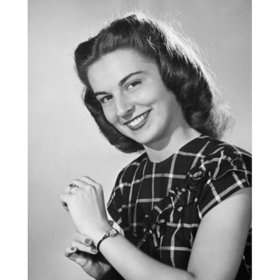 Portrait of a young woman smiling Poster Print (18 x 24)