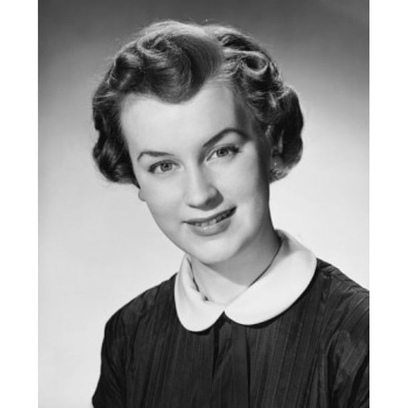 Portrait of a young woman smiling Poster Print (18 x 24)