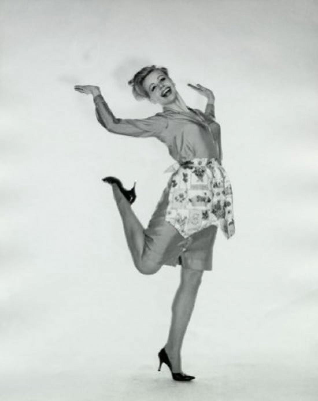 Portrait of a young woman standing on one leg Canvas Art - (24 x 36)
