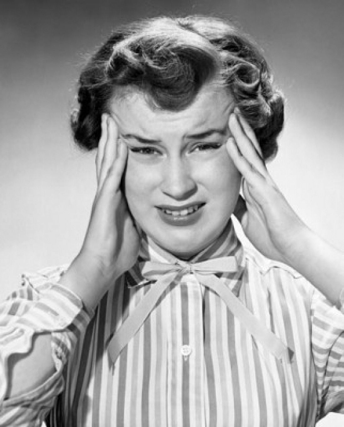Portrait of a young woman suffering from a headache Canvas Art - (18 x 24)
