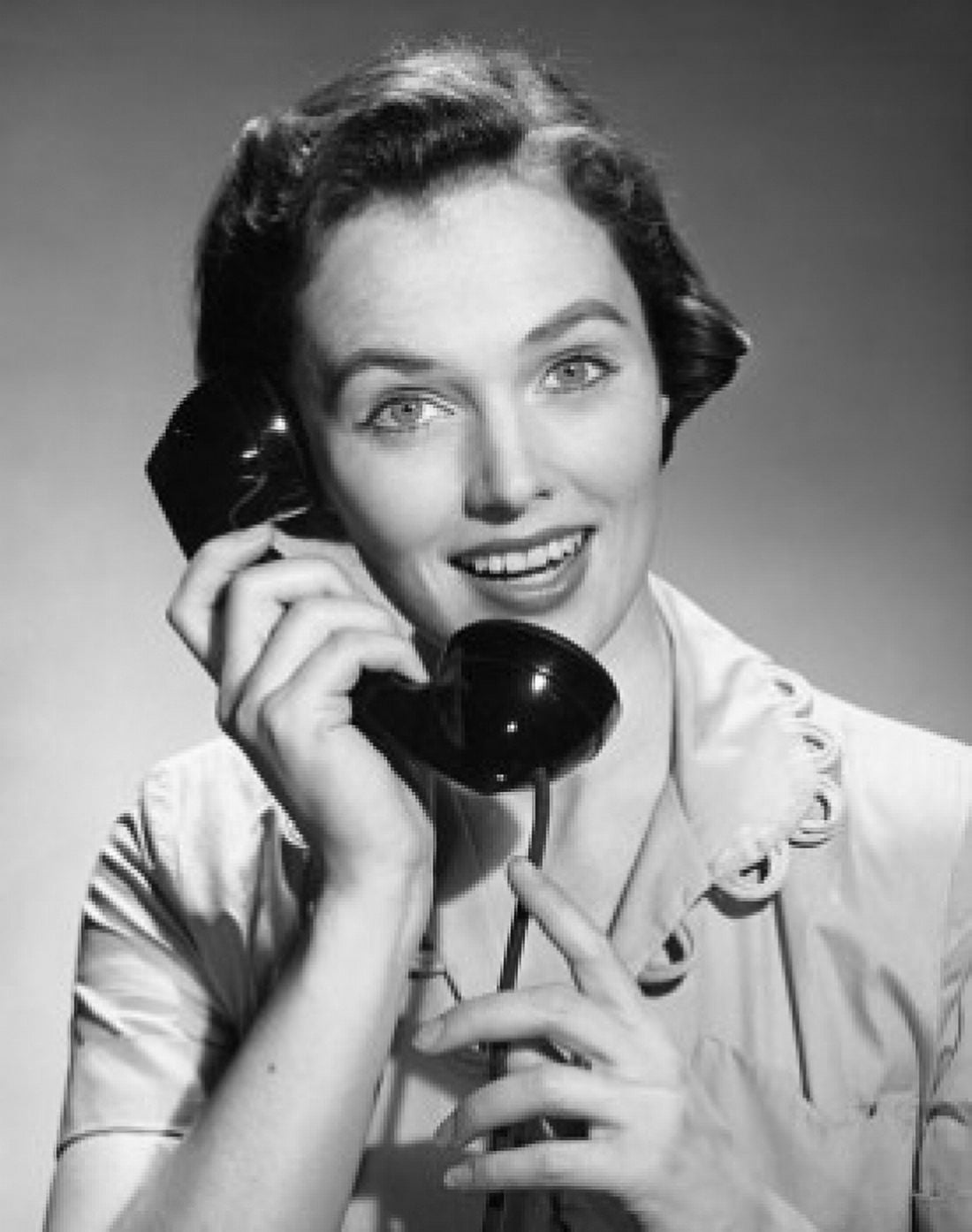 Portrait of a young woman talking on the telephone Canvas Art - (18 x 24)
