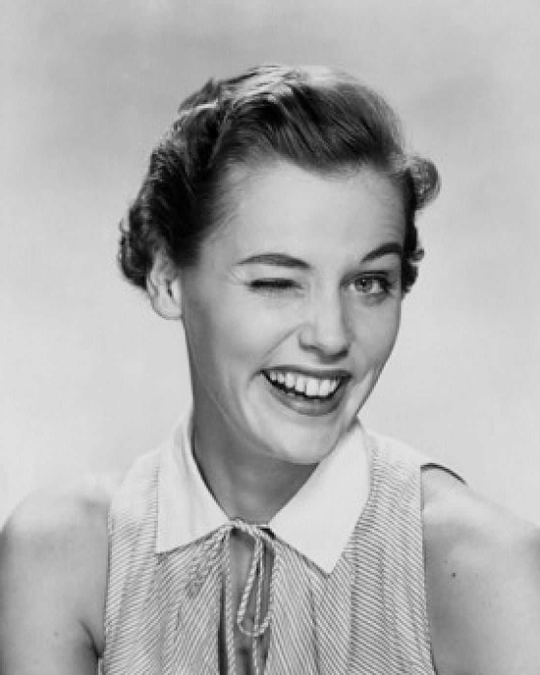Portrait of a young woman winking Canvas Art - (18 x 24)