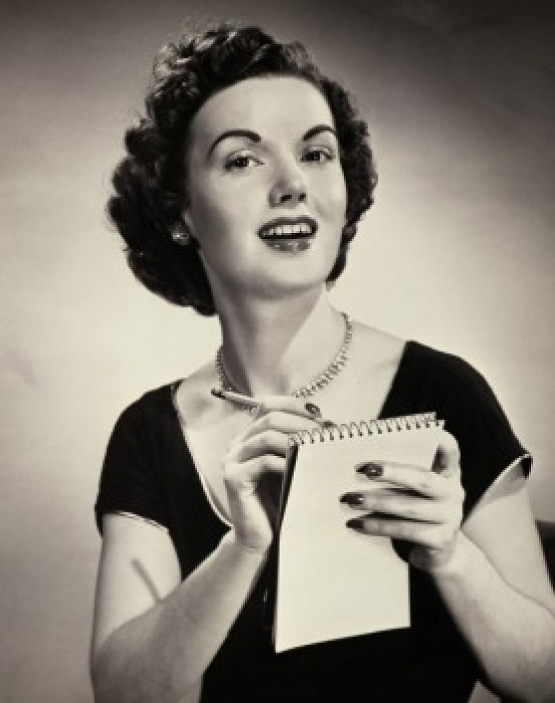 Portrait of a young woman writing on a notepad Canvas Art - (18 x 24)