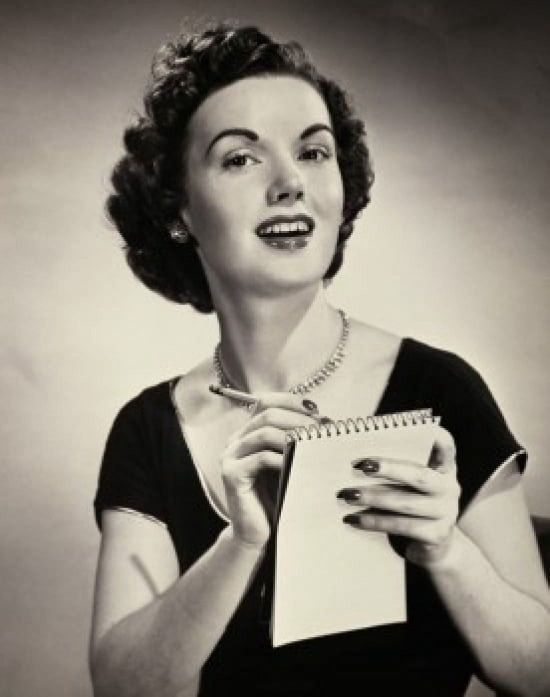 Portrait of a young woman writing on a notepad Canvas Art - (24 x 36)