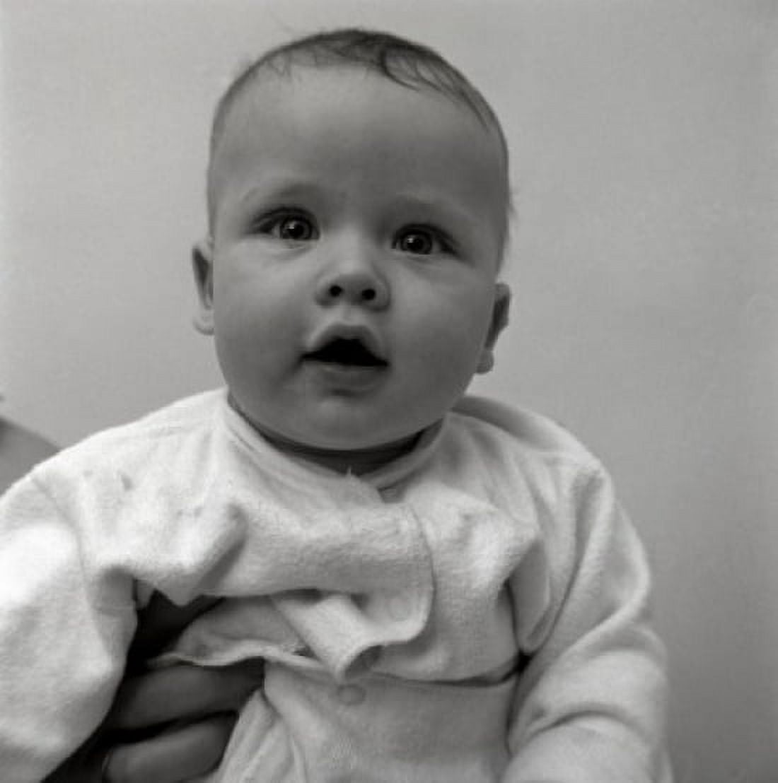 Portrait of baby being hold by parent Canvas Art - (18 x 24)