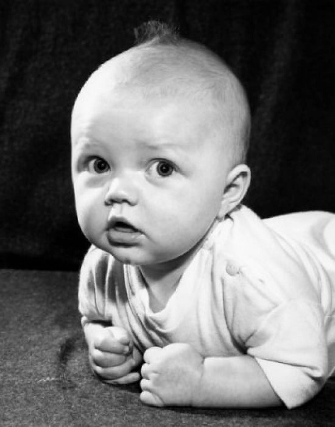 Portrait of baby boy lying down Canvas Art - (24 x 36)