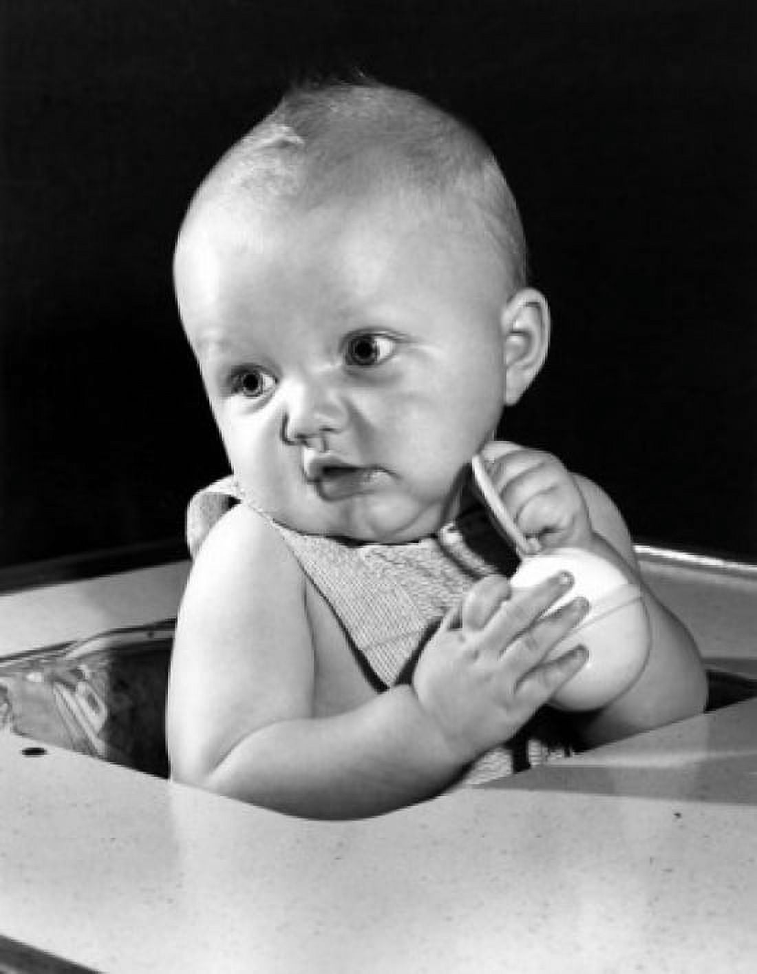 Portrait of baby holding toy Canvas Art - (18 x 24)