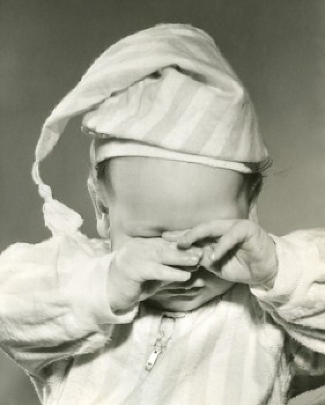 Portrait of baby wearing nightcap Canvas Art - (18 x 24)