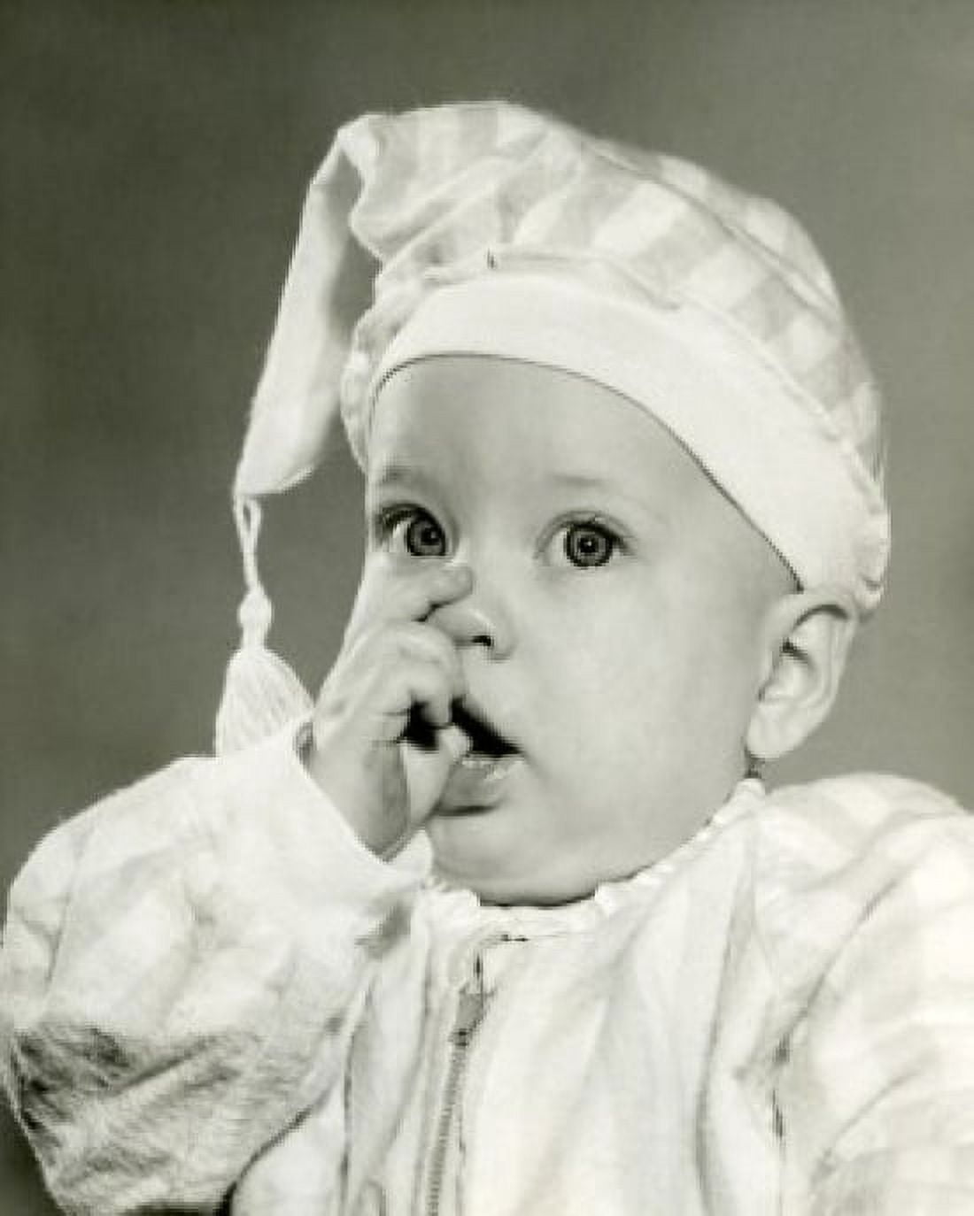 Portrait of baby wearing nightcap Canvas Art - (24 x 36)