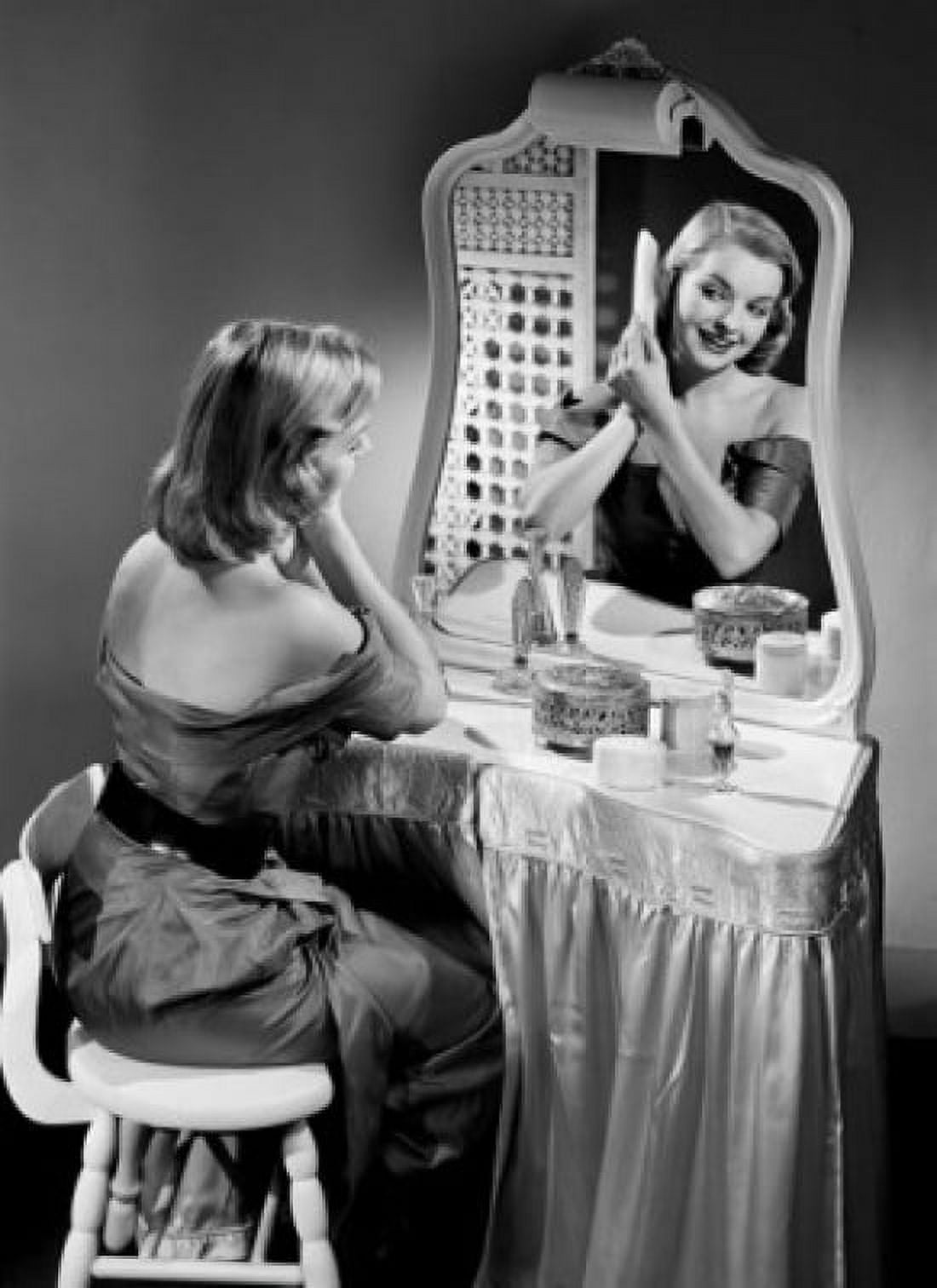 Portrait of beautiful woman combing hair in front of mirror Canvas Art - (24 x 36)