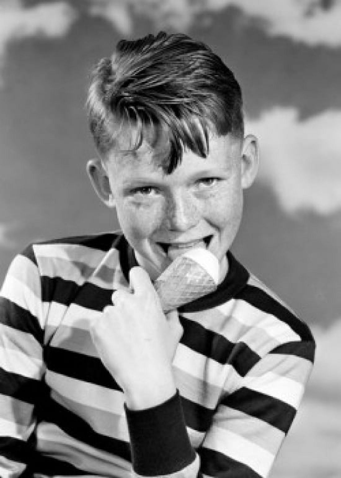 Portrait of boy eating ice cream Canvas Art - (18 x 24)