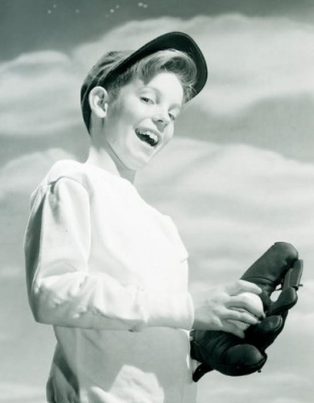 Portrait of boy holding baseball Canvas Art - (24 x 36)