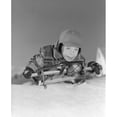 thumbnail image 1 of Portrait of boy laying on front, holding sleigh Poster Print (24 x 36), 1 of 4