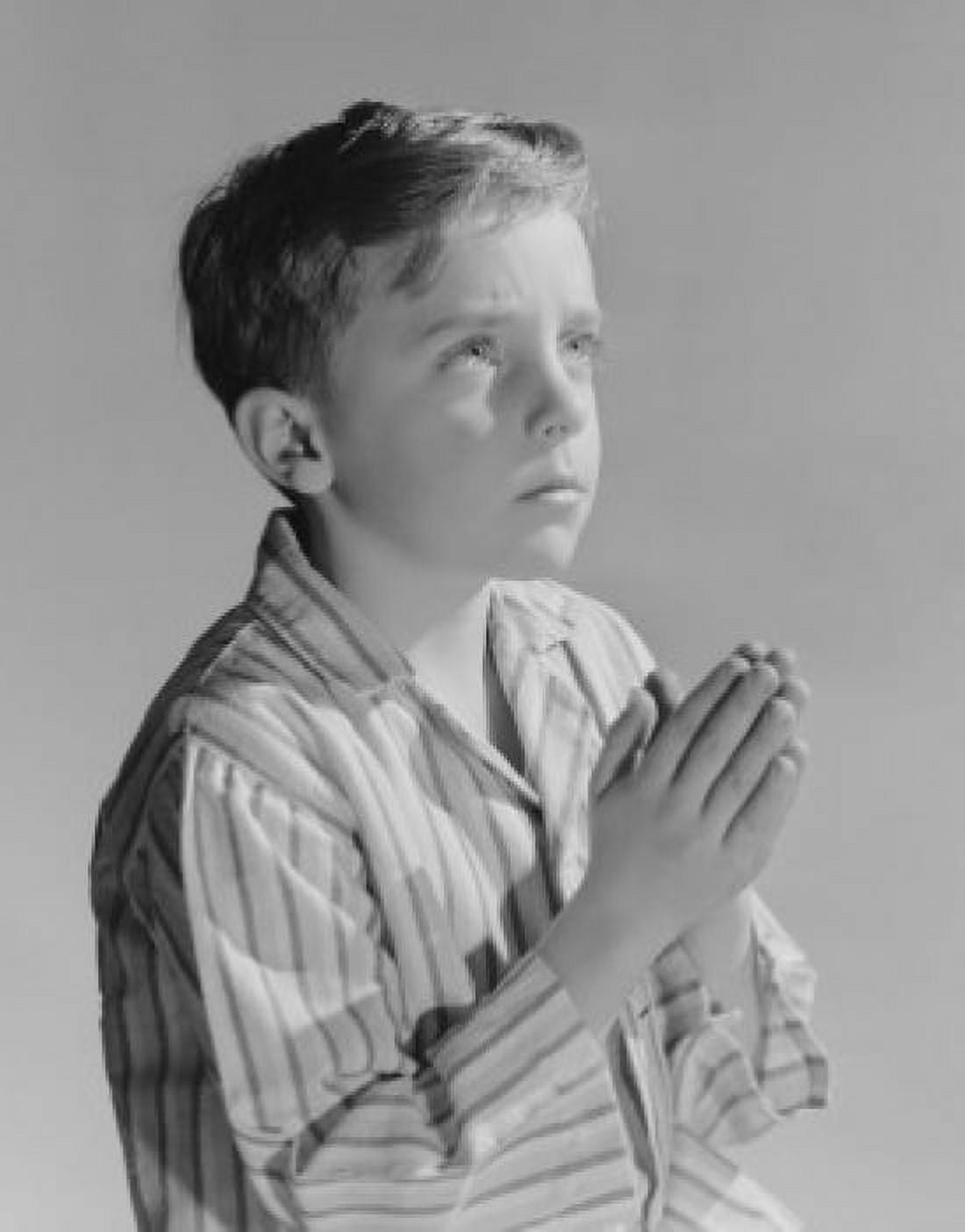 Portrait of boy praying Canvas Art - (18 x 24)