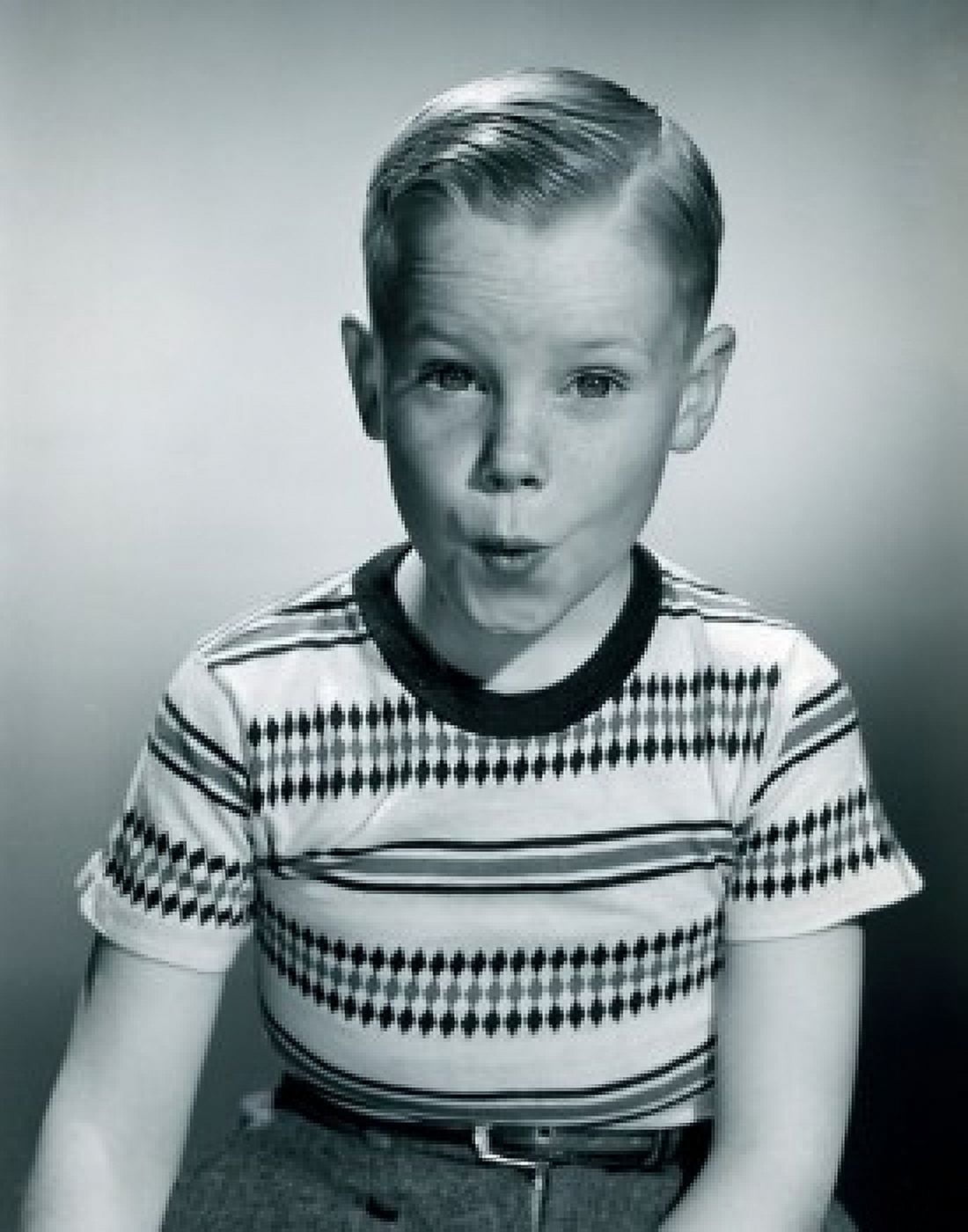 Portrait of boy pulling funny faces Canvas Art - (24 x 36)