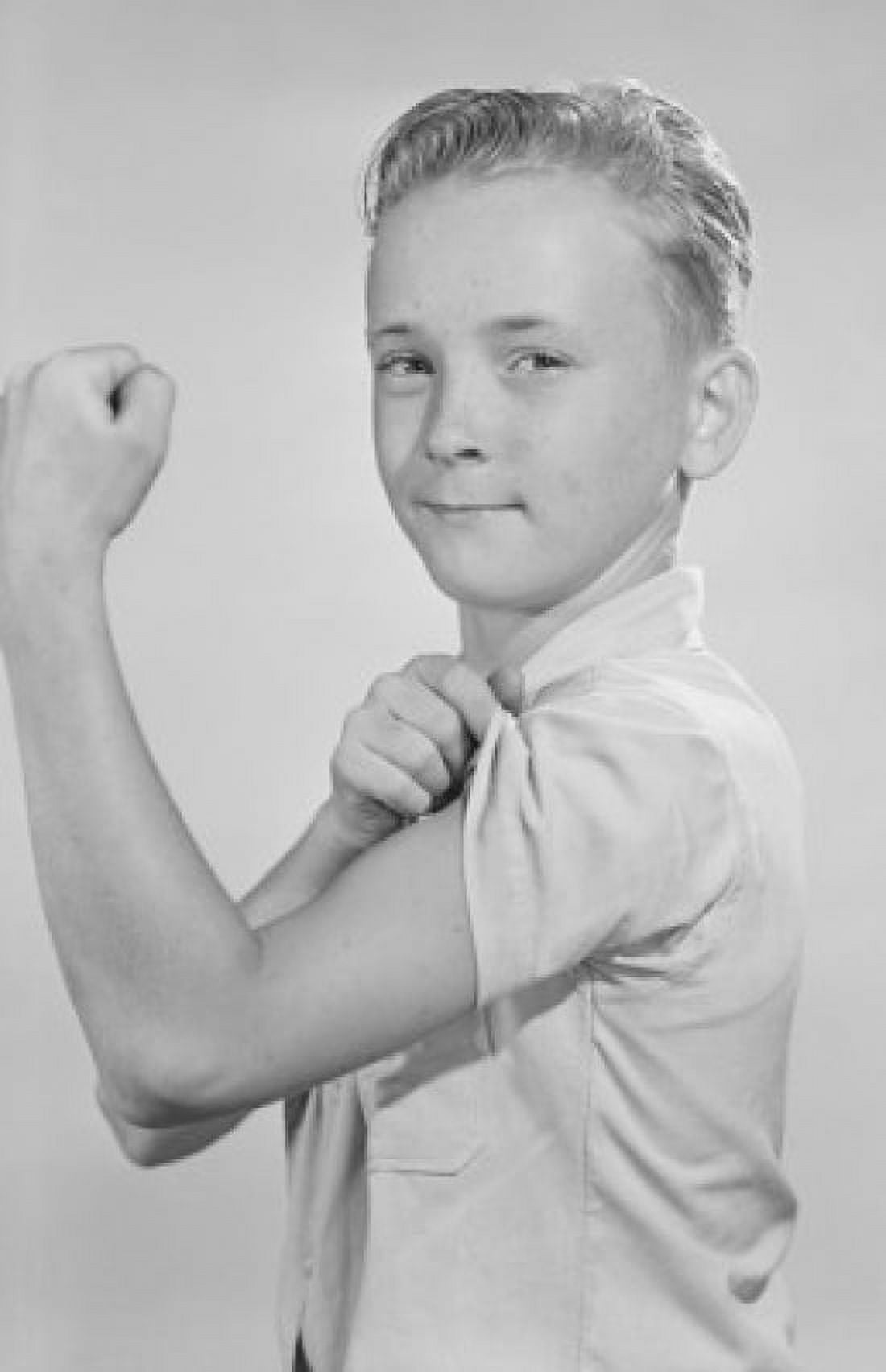 Portrait of boy showing off muscles Canvas Art - (18 x 24)