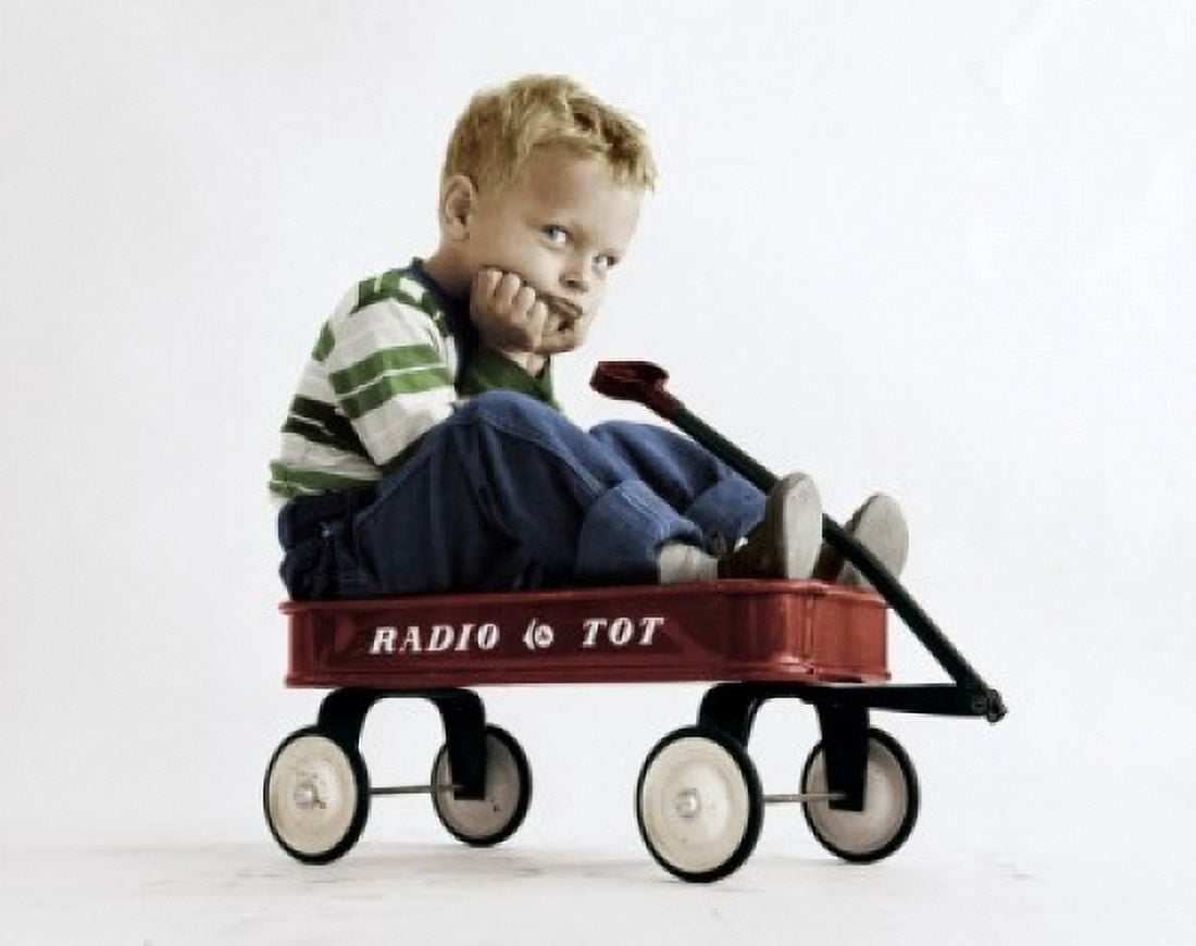 Portrait of boy sitting in wagon Canvas Art - (18 x 24)