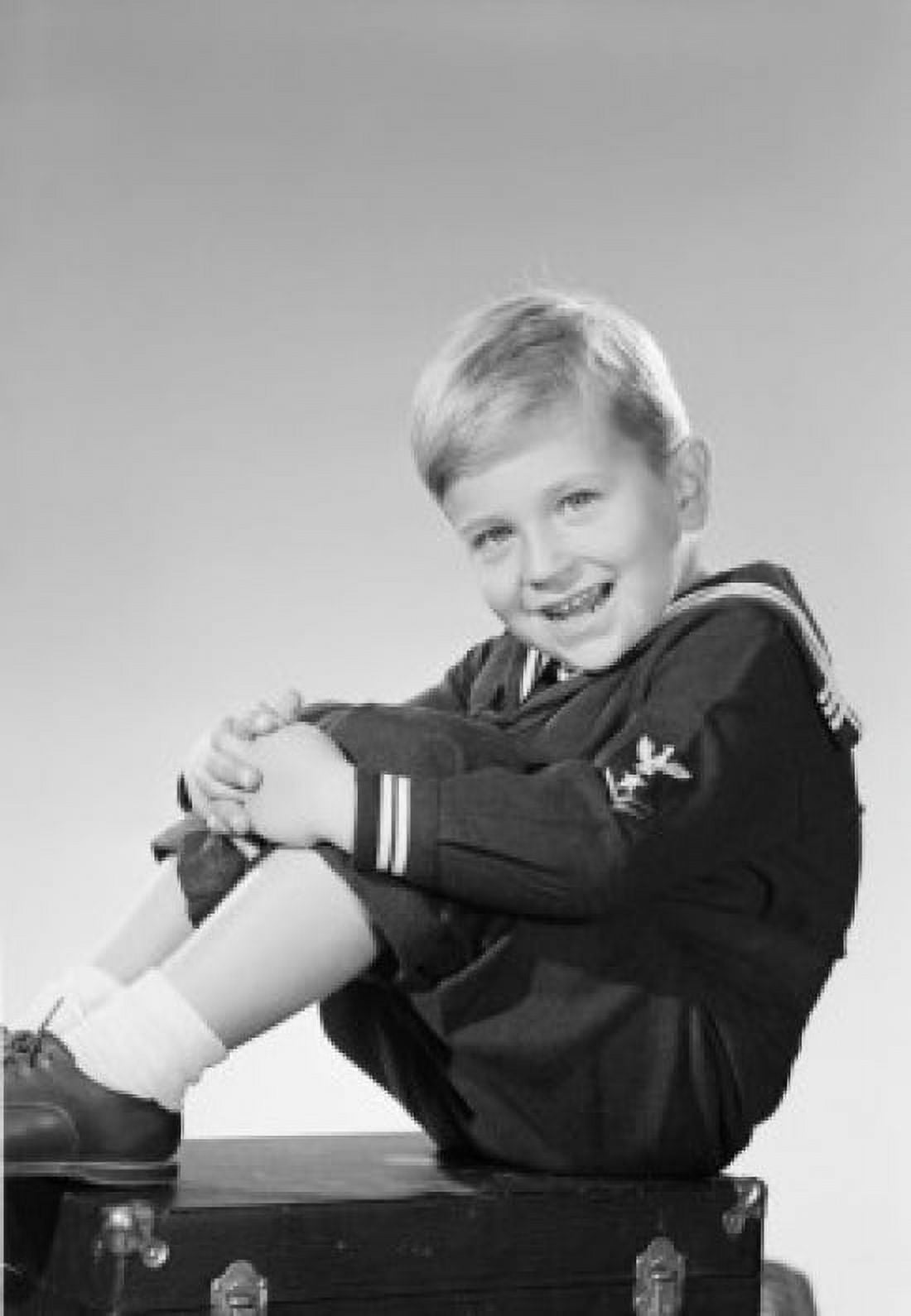 Portrait of boy sitting on suitcase Canvas Art - (18 x 24)