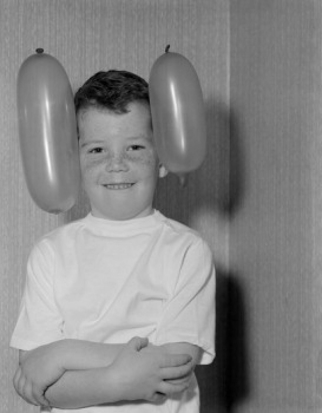 Portrait of boy with two balloons Canvas Art - (24 x 36)