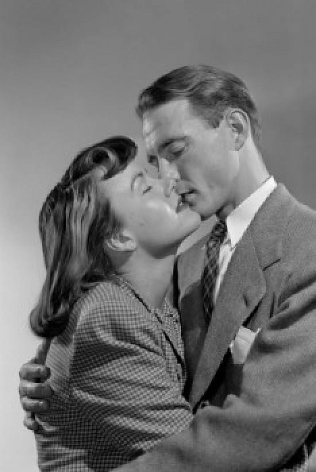 Portrait of couple embracing and kissing Canvas Art - (18 x 24)