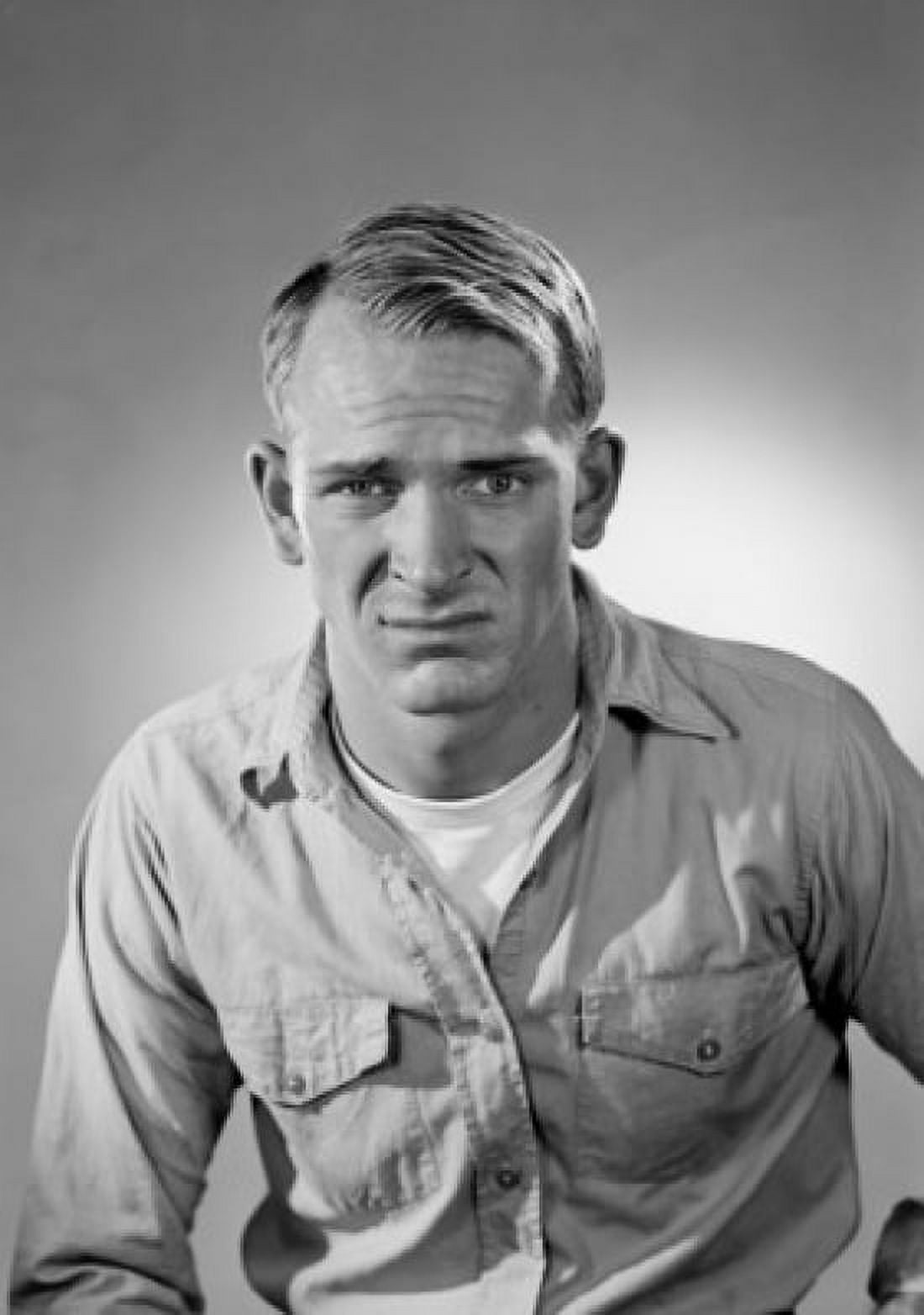 Portrait of displeased young man looking at camera studio shot Canvas Art - (18 x 24)
