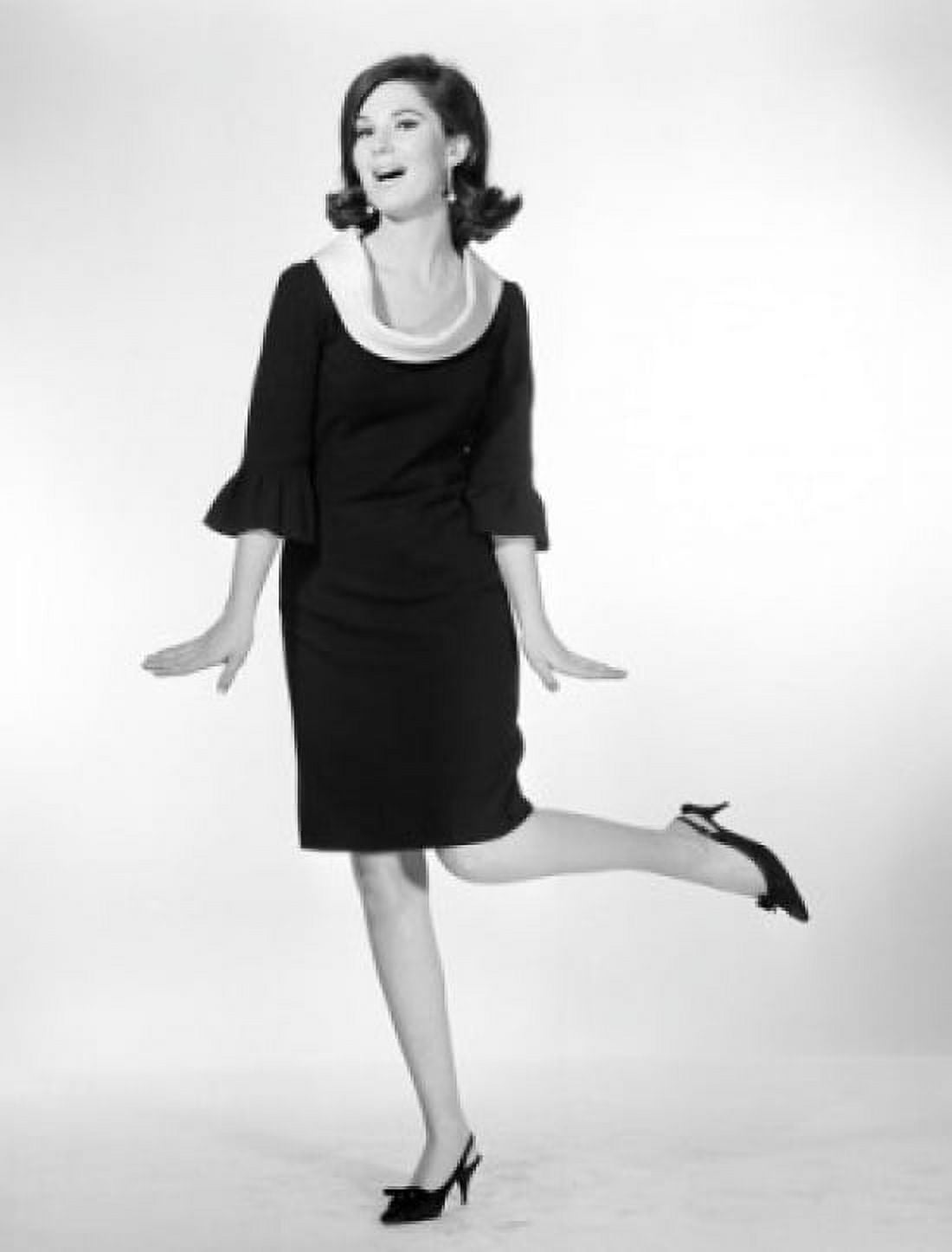 Portrait of elegant woman wearing dress and standing in one leg studio shot Canvas Art - (24 x 36)
