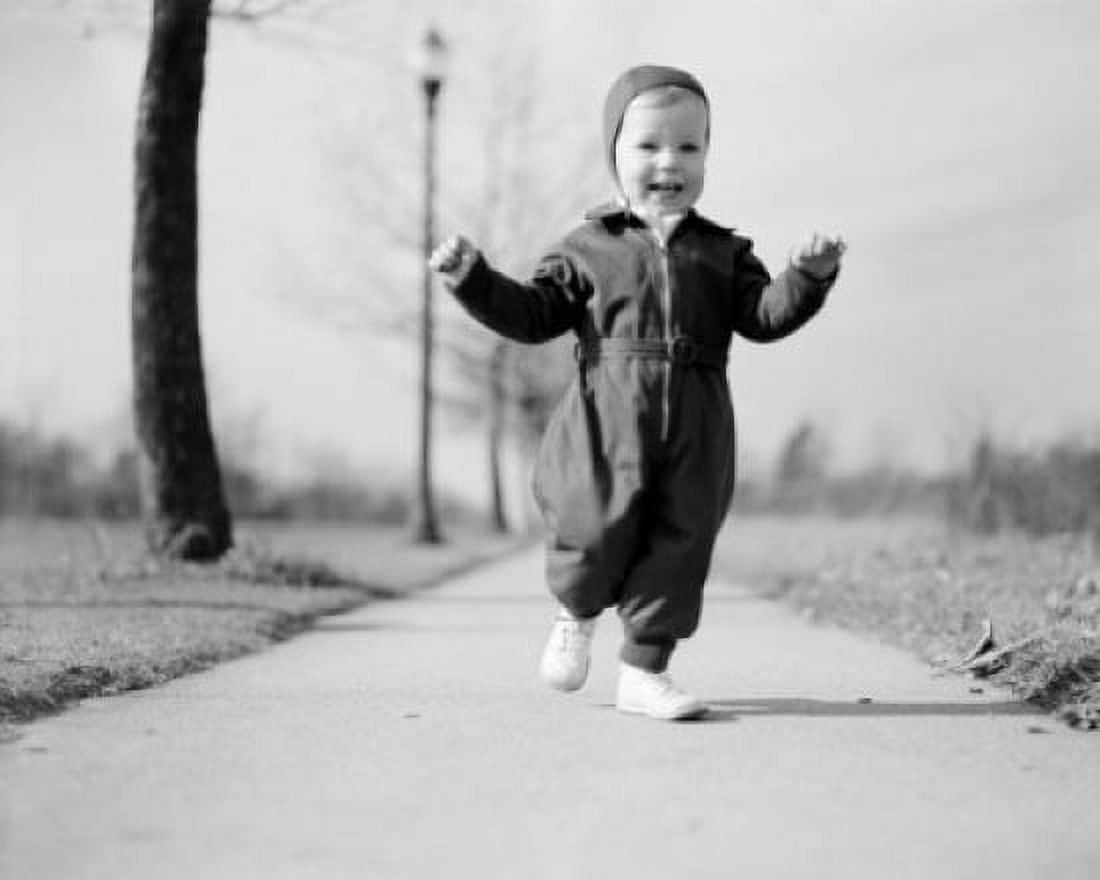 Portrait of exhilarated baby girl on footpath Canvas Art - (18 x 24)