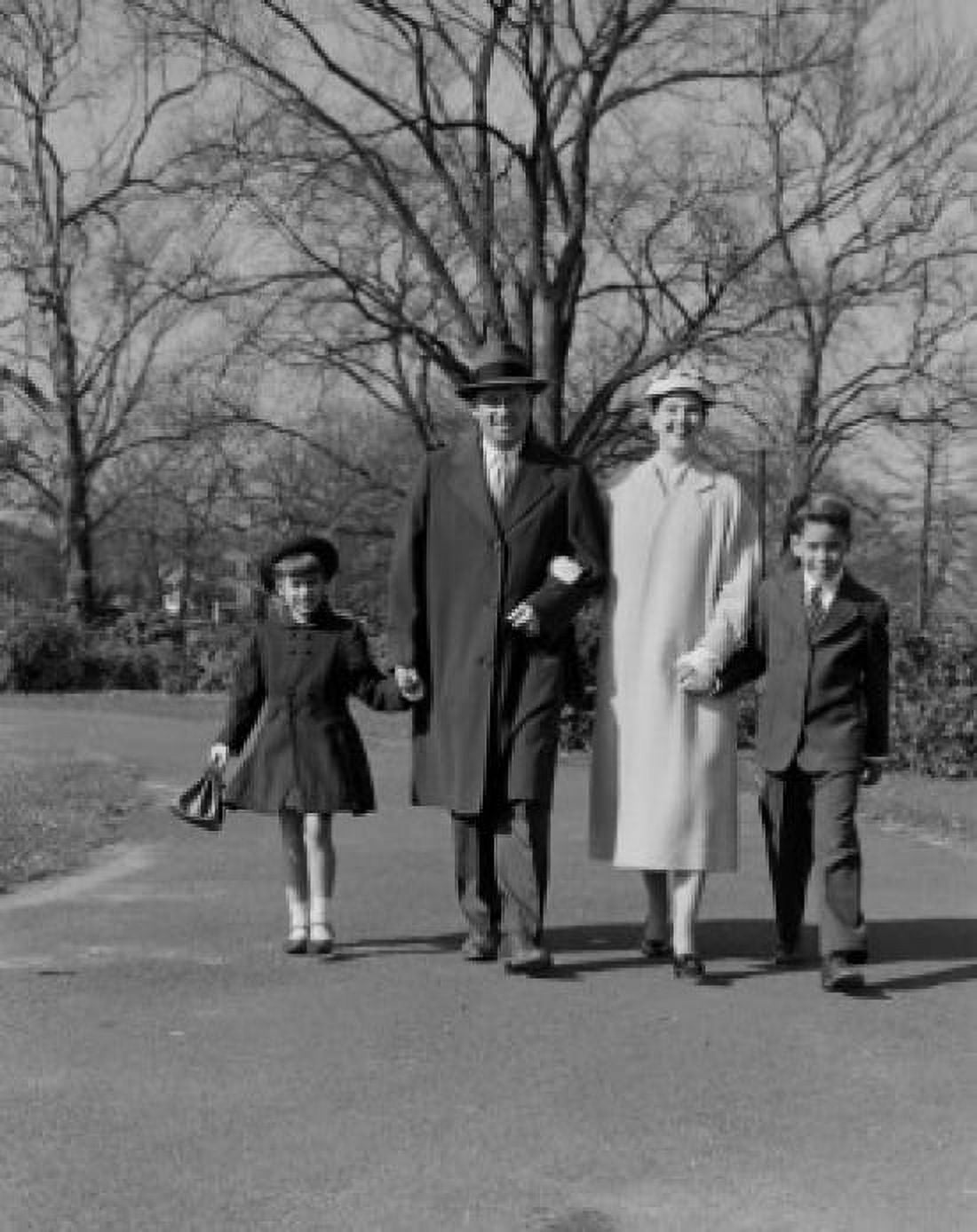 Portrait of family with two children walking in park Canvas Art - (18 x 24)