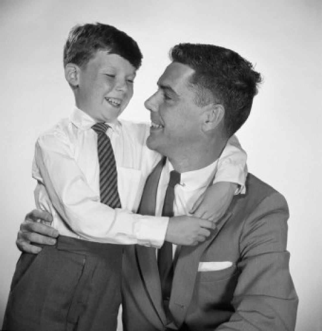 Portrait of father and son embracing Canvas Art - (18 x 24)