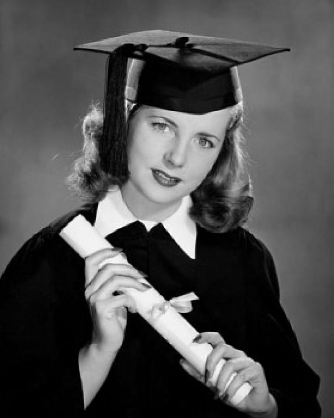 Portrait of female graduate holding her diploma Canvas Art - (18 x 24)