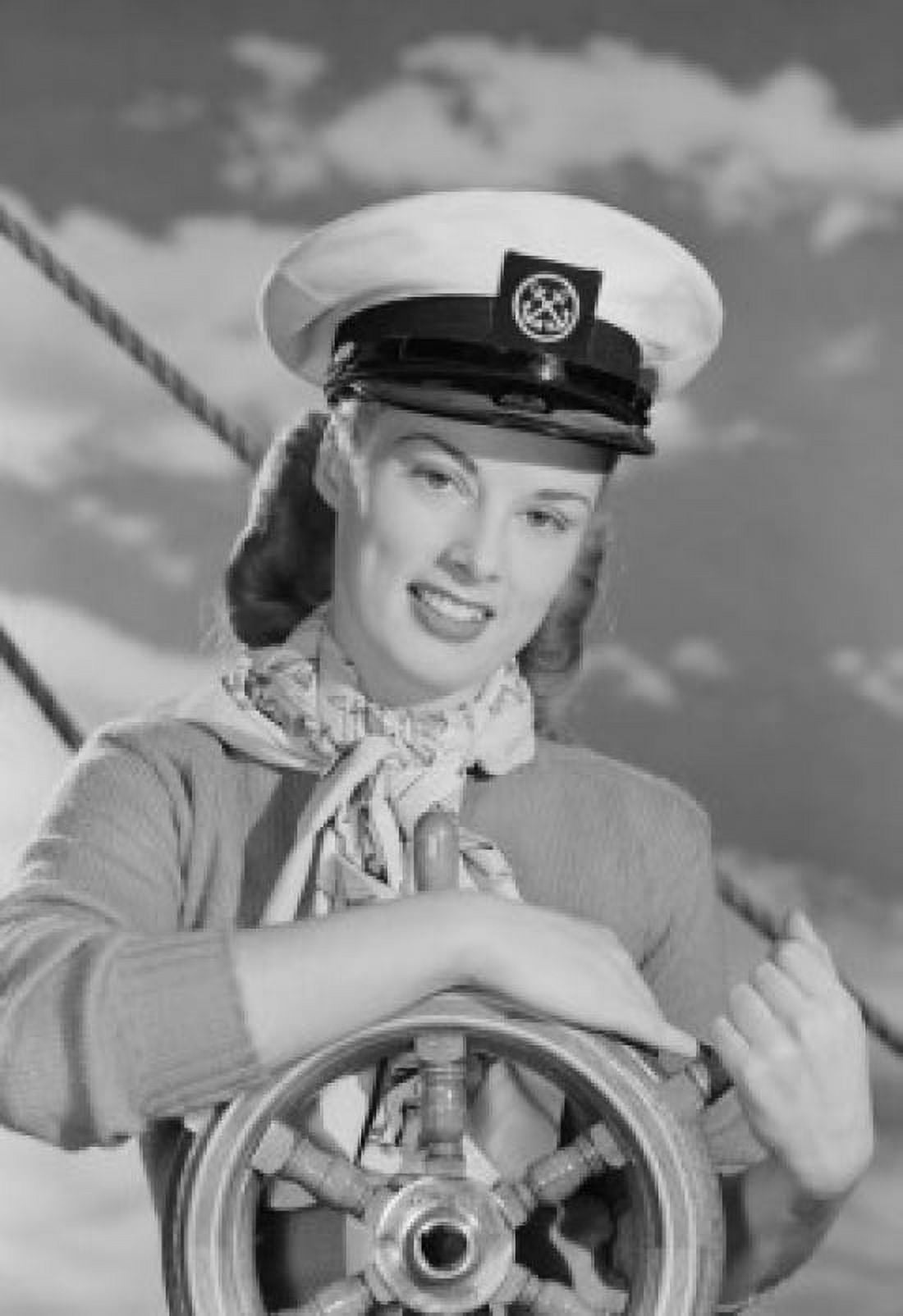 Portrait of female sailor at helm Canvas Art - (24 x 36)