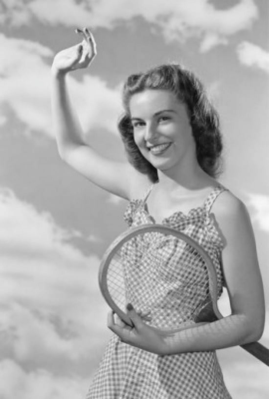 Portrait of female tennis player smiling Canvas Art - (24 x 36)