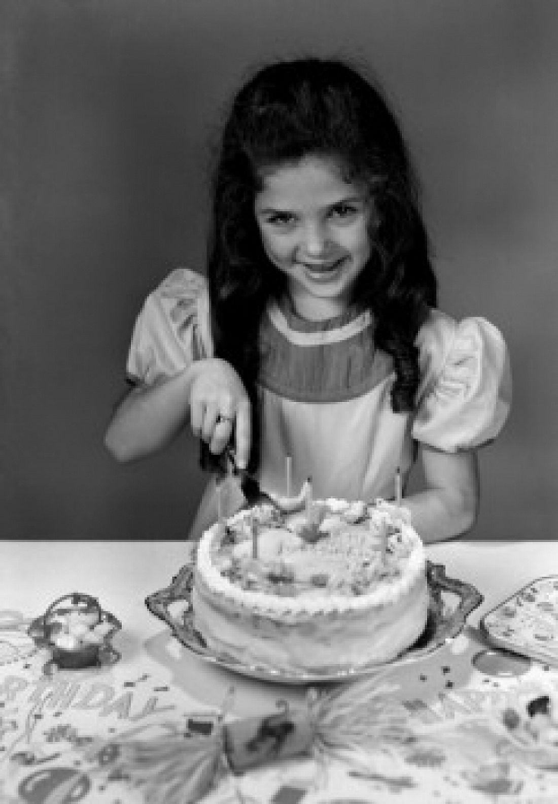 Portrait of girl cutting birthday cake Canvas Art - (18 x 24)