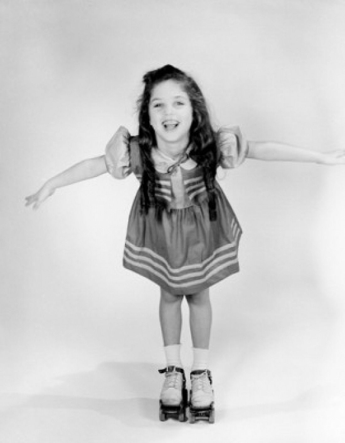 Portrait of girl on roller skate Canvas Art - (24 x 36)