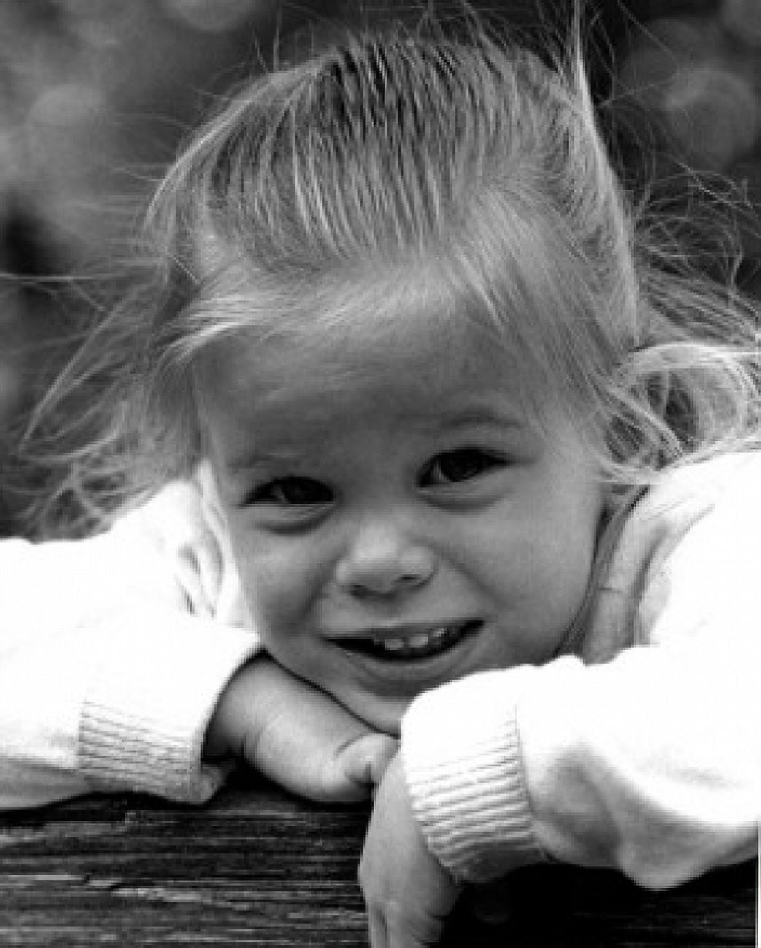 Portrait of girl smiling outdoors Canvas Art - (24 x 36)