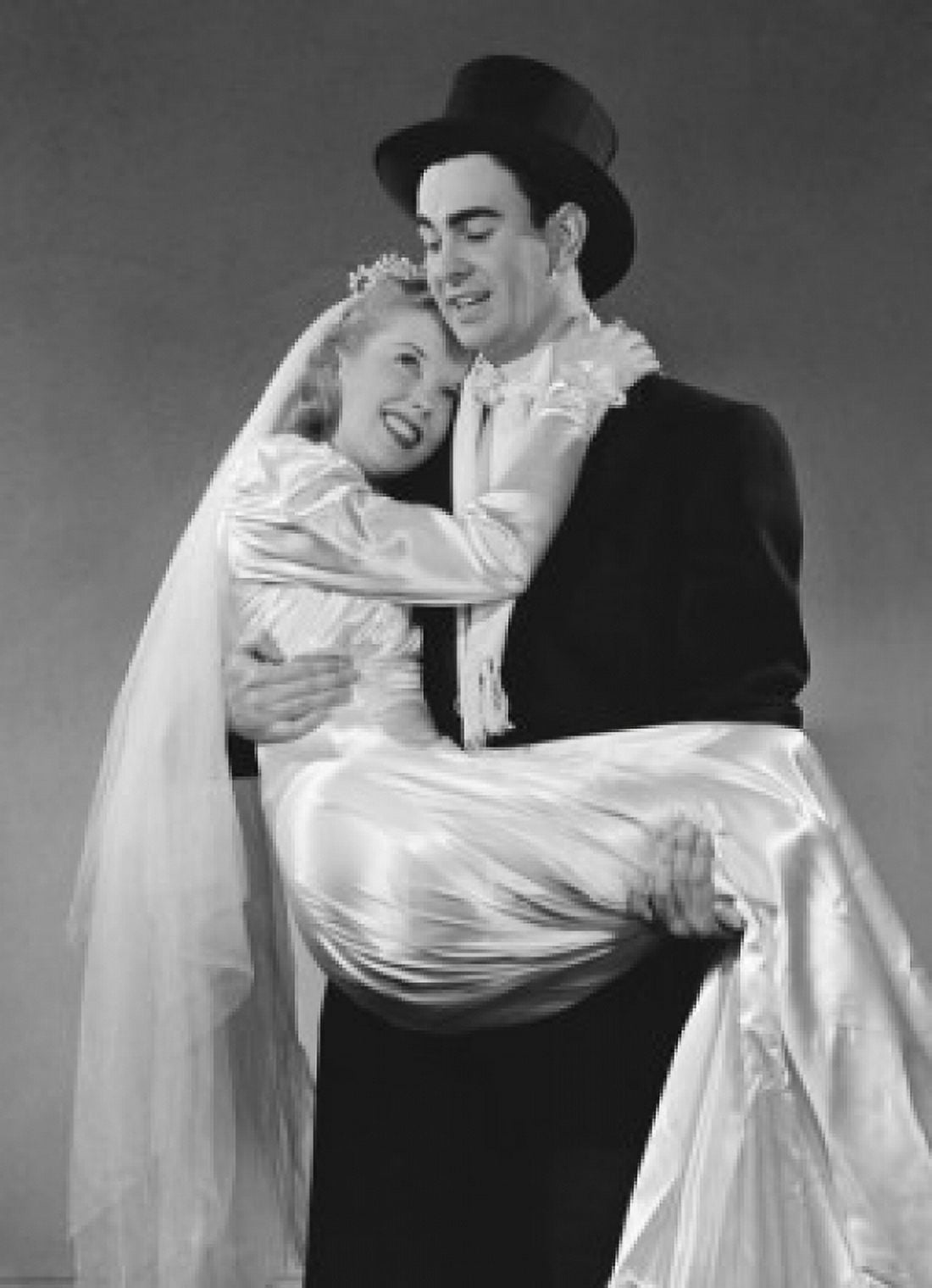 Portrait of groom carrying bride Canvas Art - (24 x 36)