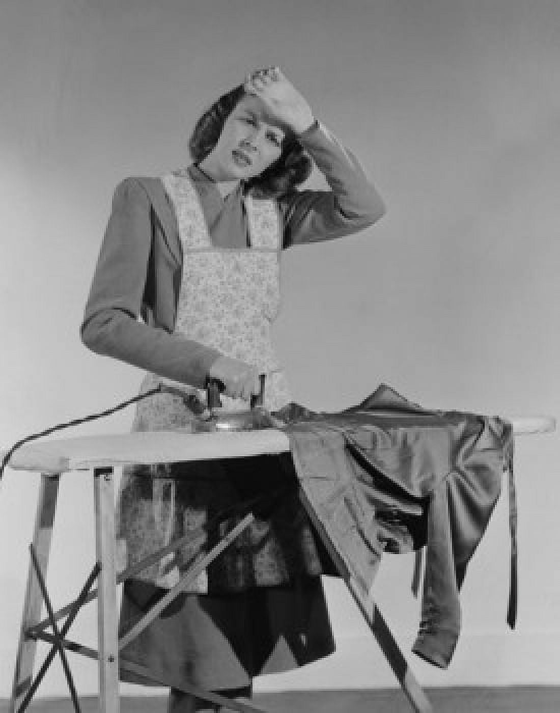 Portrait of housewife ironing Canvas Art - (24 x 36)