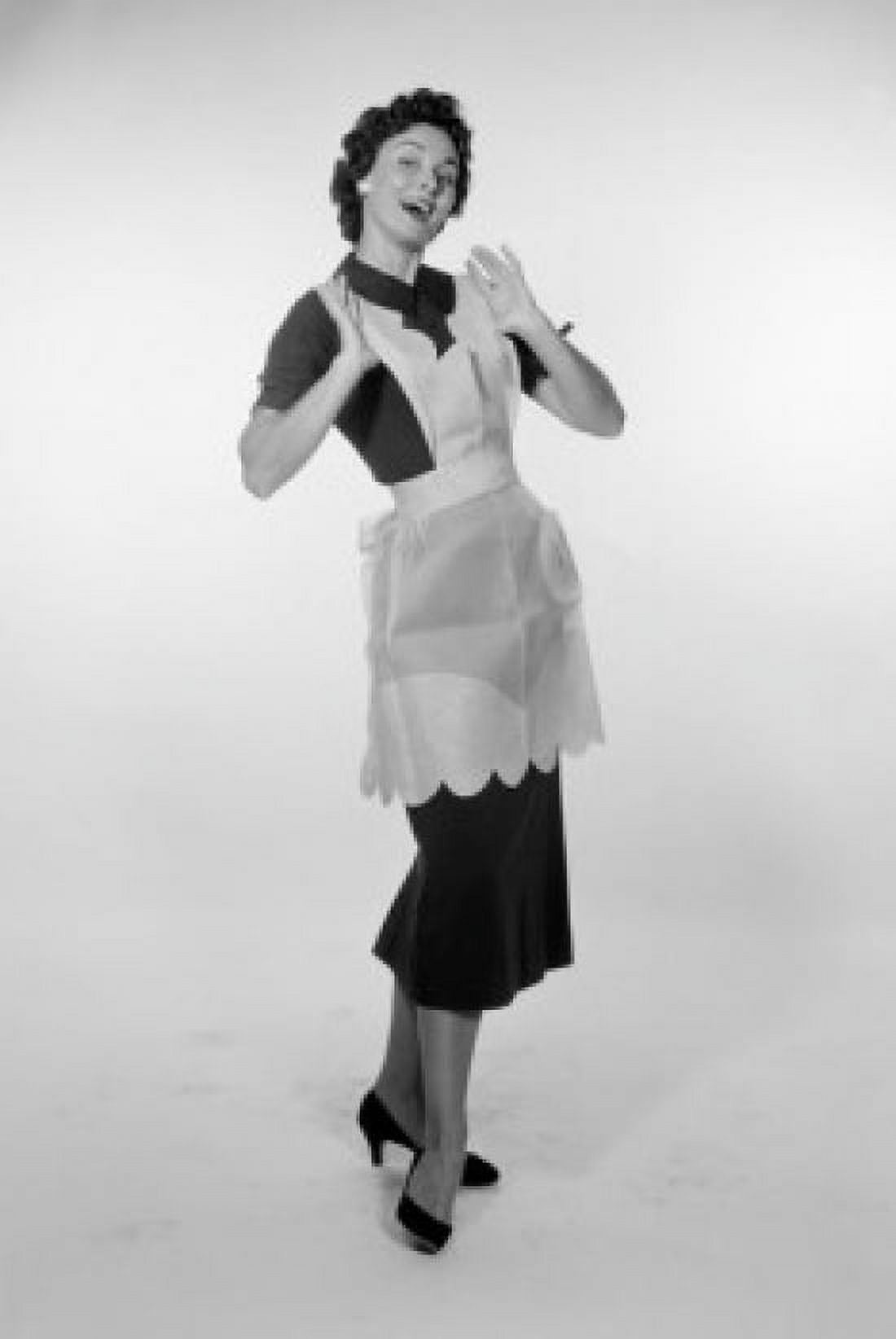 Portrait of housewife wearing apron Canvas Art - (24 x 36)