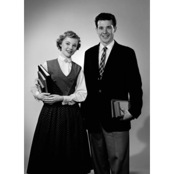 Portrait of male and female students holding books Poster Print (24 x 36)