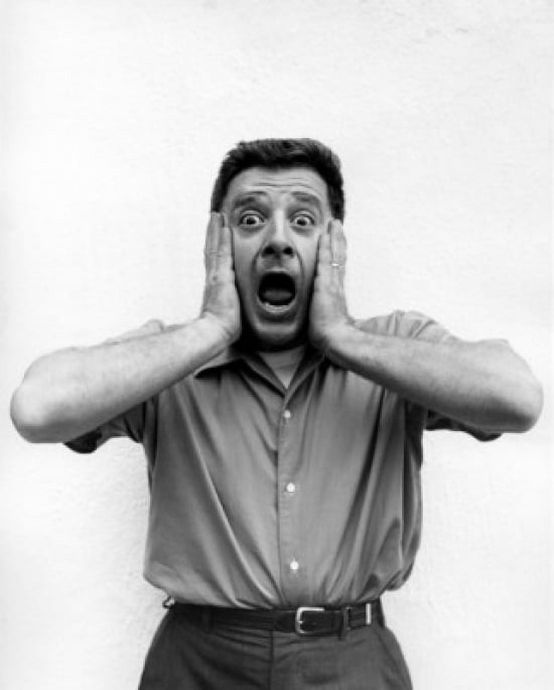 Portrait of man holding head in hands and shouting Canvas Art - (18 x 24)