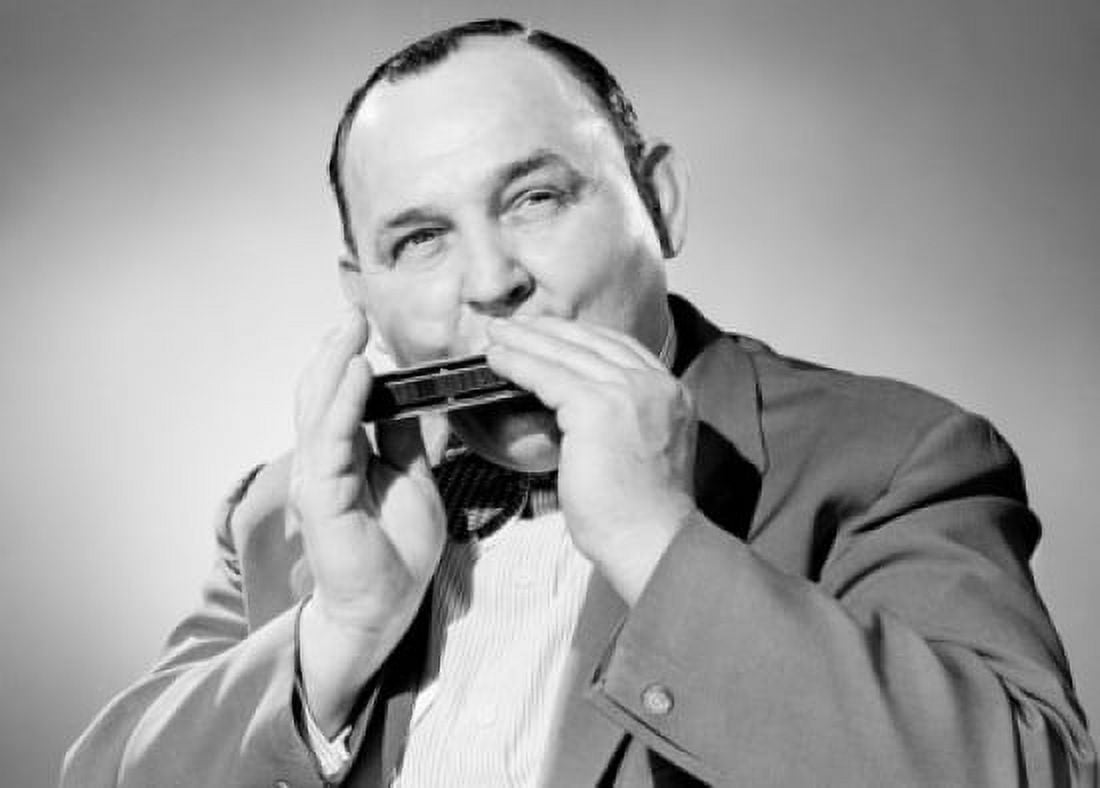 Portrait of man playing on harmonica Canvas Art - (24 x 36)