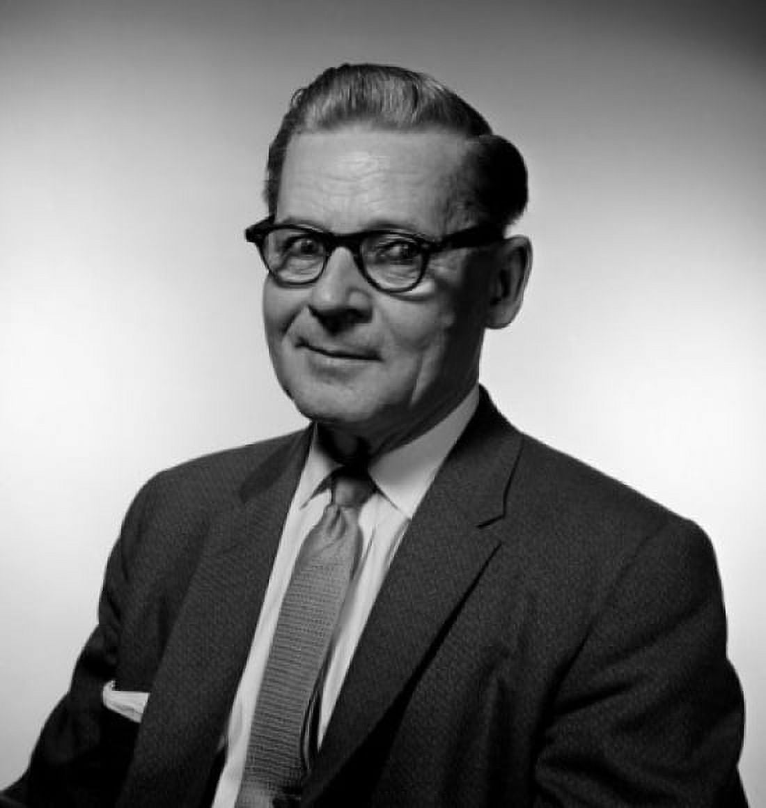 Portrait of mature businessman wearing glasses studio shot Canvas Art - (24 x 36)