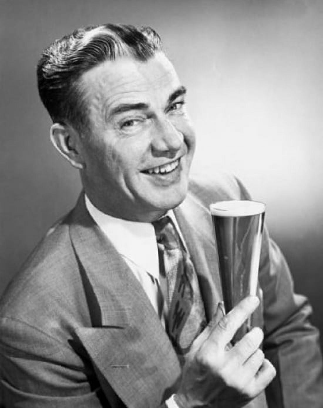 Portrait of mature man holding glass of beer Canvas Art - (24 x 36)