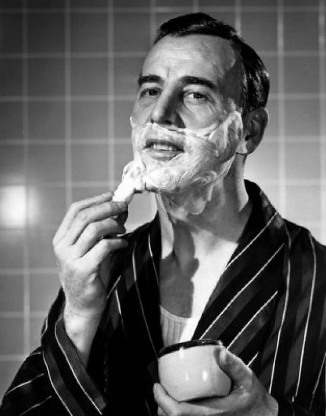 Portrait of mature man shaving Canvas Art - (18 x 24)