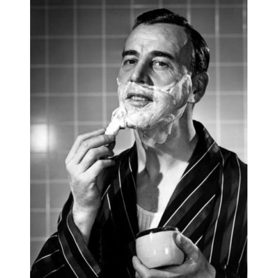 Portrait of mature man shaving Poster Print (18 x 24)
