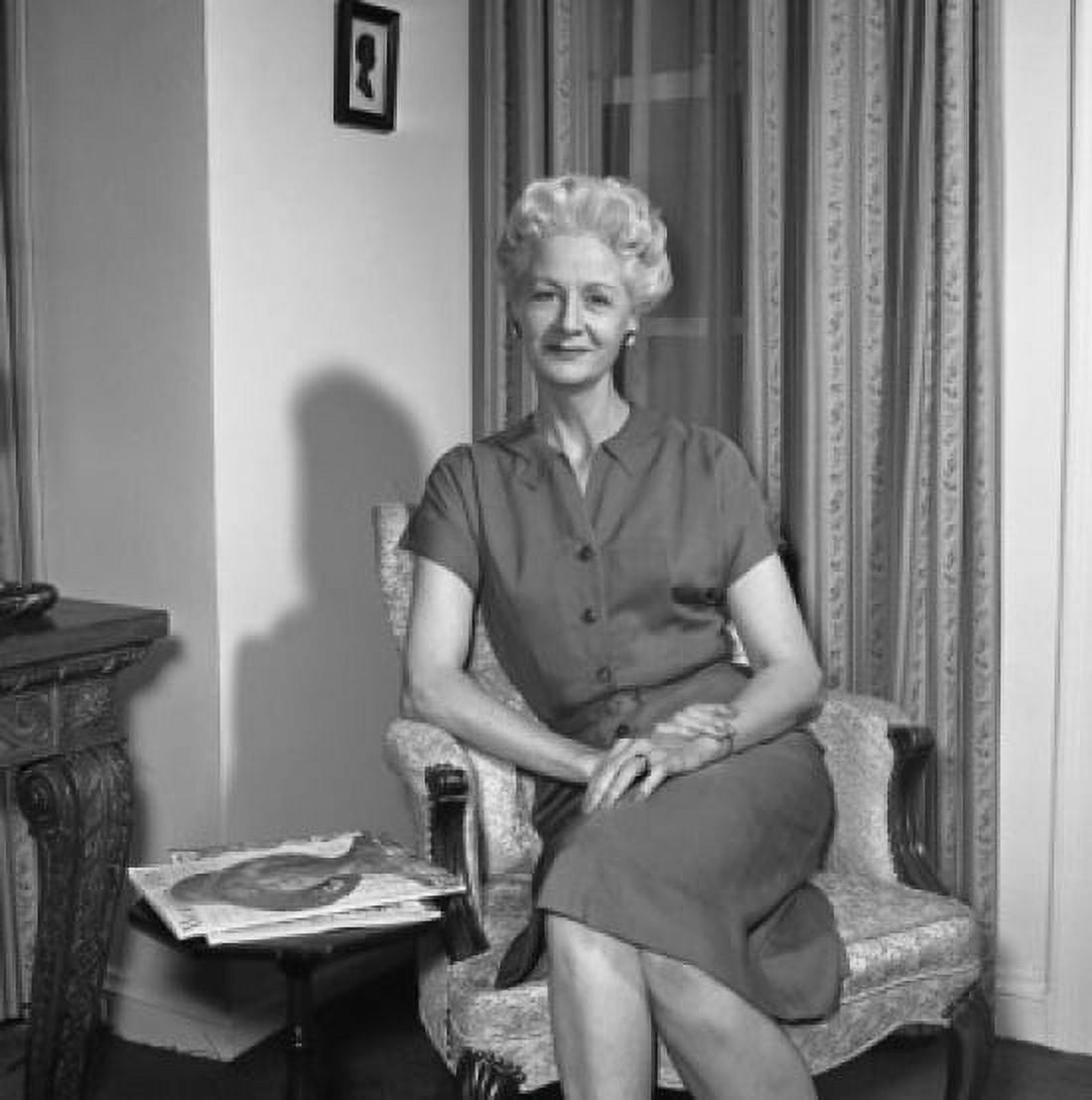 Portrait of mature woman sitting in armchair Canvas Art - (18 x 24)