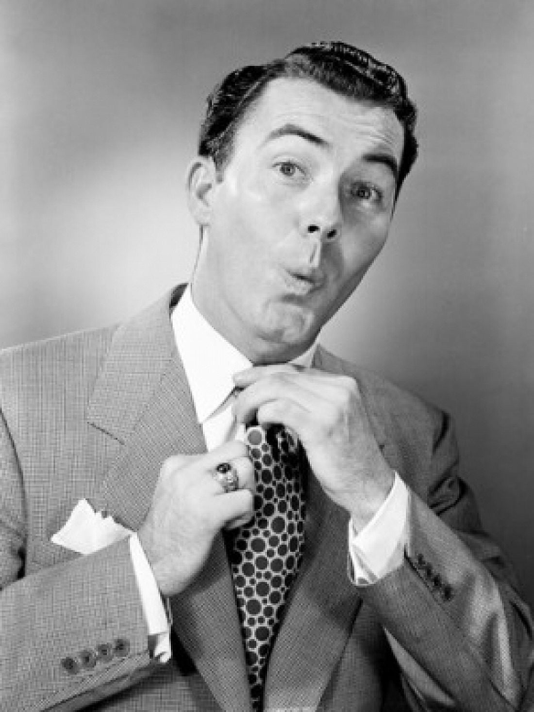 Portrait of mid adult businessman adjusting tie Canvas Art - (24 x 36)