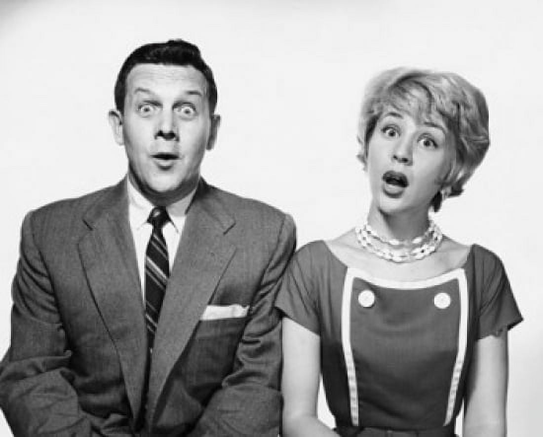Portrait of mid adult couple looking surprised Canvas Art - (18 x 24)