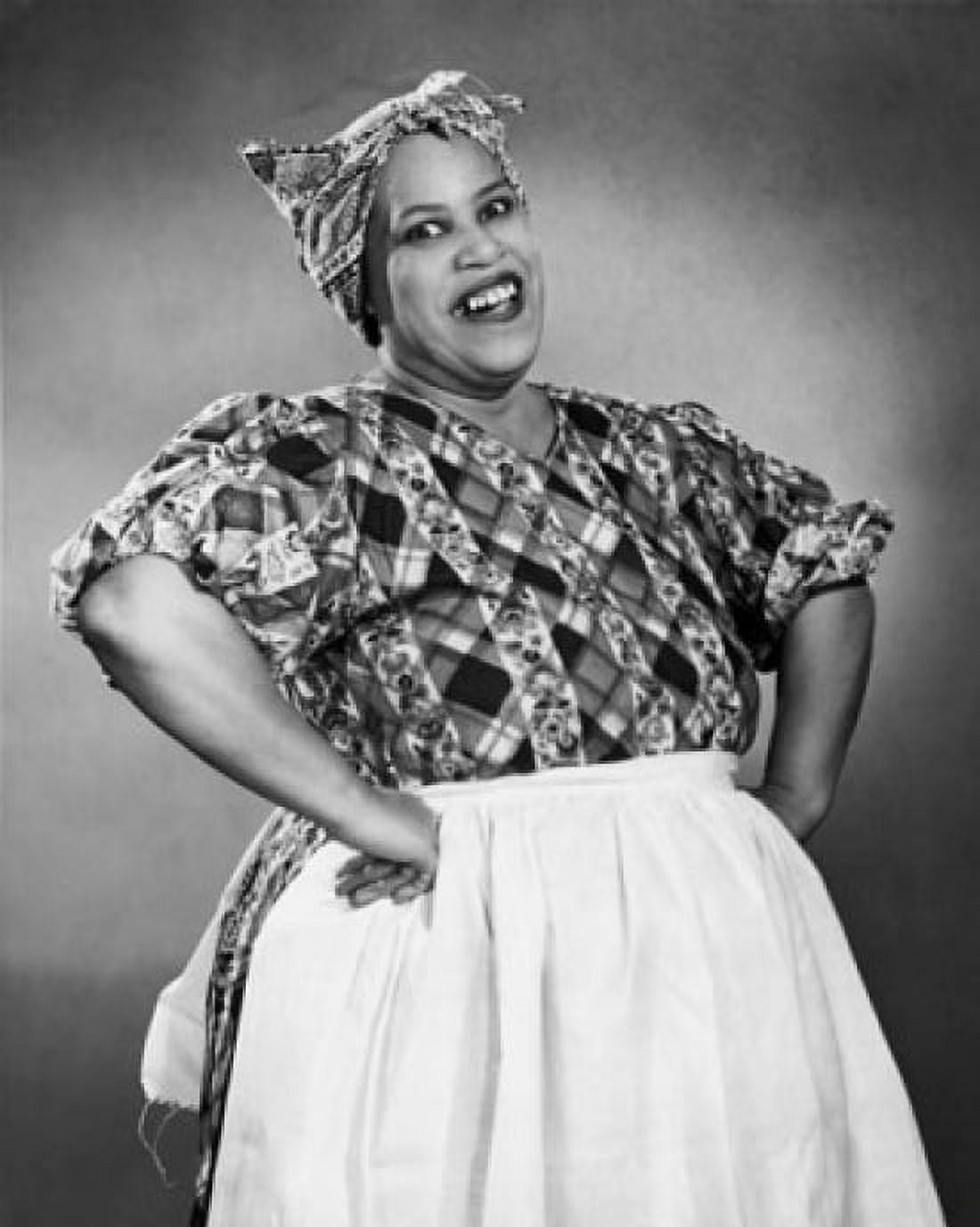 Portrait of mid adult housewife smiling with her arms akimbo Canvas Art - (18 x 24)